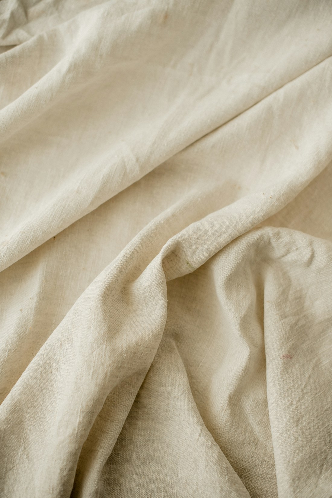 Linen sheets in warm light